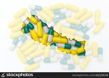 Outline nepal map with transparent background of capsules symbolizing pharmacy and medicine