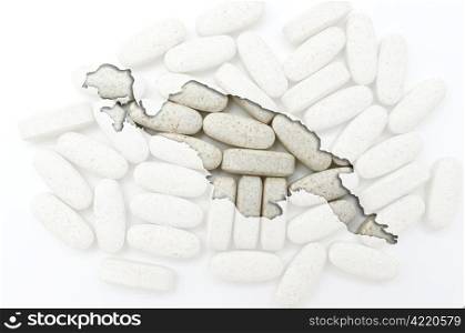 Outline new guinea map with transparent background of capsules symbolizing pharmacy and medicine