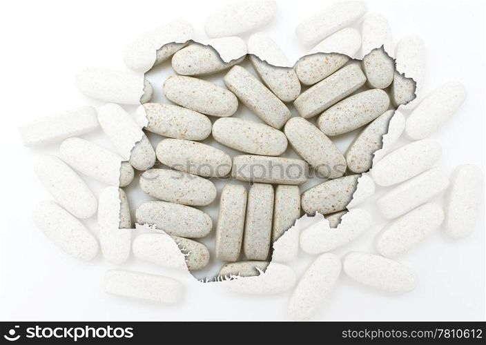 Outline nigeria map with transparent background of capsules symbolizing pharmacy and medicine