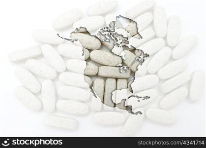 Outline north america map with transparent background of capsules symbolizing pharmacy and medicine