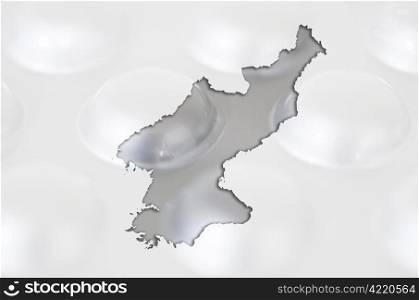 Outline north korea map with transparent background of capsules symbolizing pharmacy and medicine