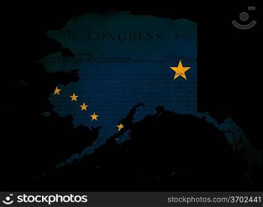 Outline of American USA Alaska state with grunge effect flag insert and overlay of Declaration of Independence document