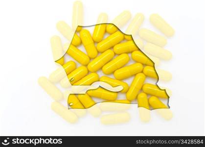 Outline senegal map with transparent background of capsules symbolizing pharmacy and medicine