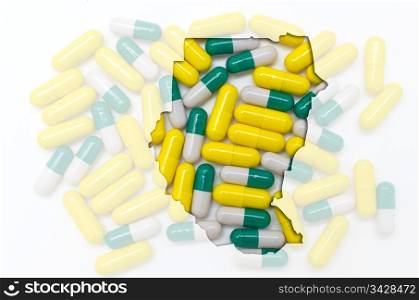 Outline sudan map with transparent background of capsules symbolizing pharmacy and medicine