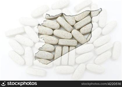 Outline syria map with transparent background of capsules symbolizing pharmacy and medicine