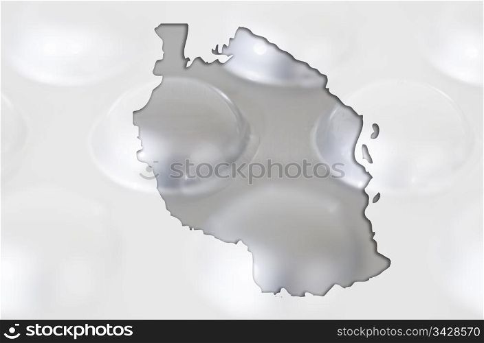 Outline tanzania map with transparent background of capsules symbolizing pharmacy and medicine