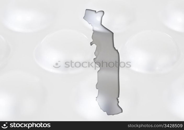 Outline togo map with transparent background of capsules symbolizing pharmacy and medicine