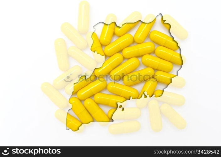 Outline uganda map with transparent background of capsules symbolizing pharmacy and medicine