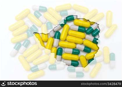 Outline zimbabwe map with transparent background of capsules symbolizing pharmacy and medicine
