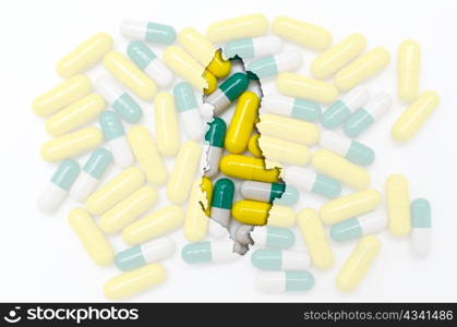 Outlined albania map with transparent background of capsules symbolizing pharmacy and medicine