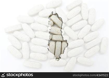 Outlined albania map with transparent background of capsules symbolizing pharmacy and medicine