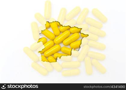 Outlined andorra map with transparent background of capsules symbolizing pharmacy and medicine