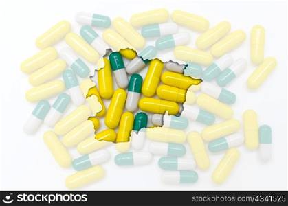 Outlined andorra map with transparent background of capsules symbolizing pharmacy and medicine