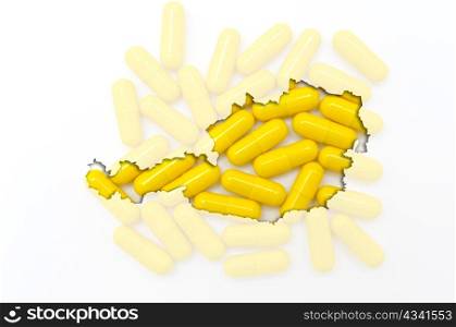 Outlined austria map with transparent background of capsules symbolizing pharmacy and medicine