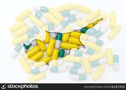 Outlined cyprus map with transparent background of capsules symbolizing pharmacy and medicine