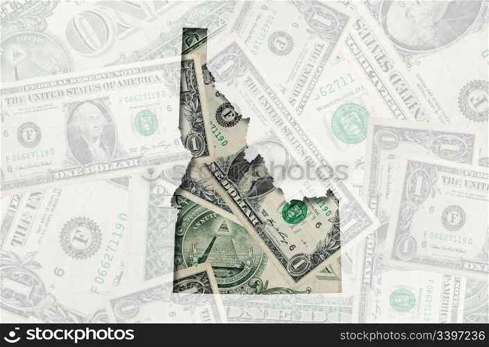 Outlined idaho map of with transparent background of US dollar banknotes