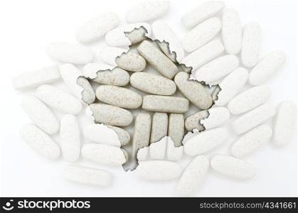 Outlined kosovo map with transparent background of capsules symbolizing pharmacy and medicine