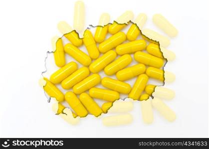 Outlined macedonia map with transparent background of capsules symbolizing pharmacy and medicine