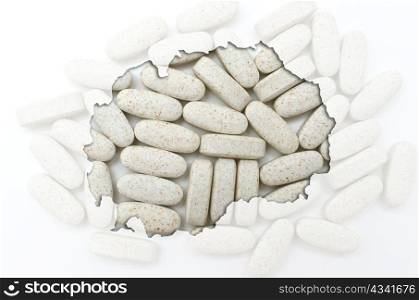 Outlined macedonia map with transparent background of capsules symbolizing pharmacy and medicine