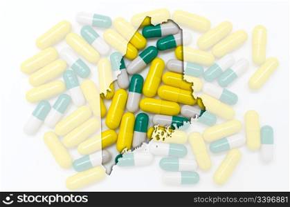 Outlined maine with transparent background of capsules