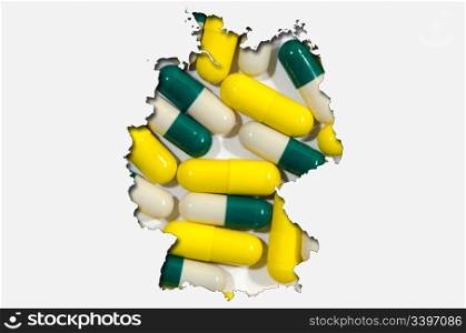 Outlined map of Germany with transparent background of pills