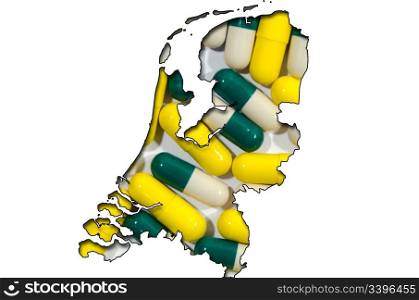 Outlined map of Netherlands with transparent background of pills