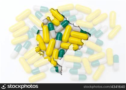 Outlined montenegro map with transparent background of capsules symbolizing pharmacy and medicine