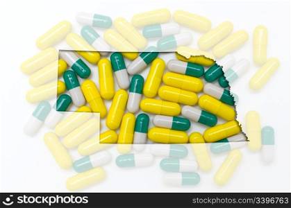 Outlined nebraska with transparent background of capsules
