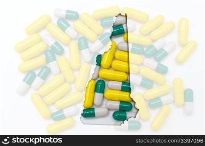 Outlined new hampshire with transparent background of capsules