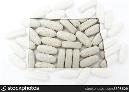 Outlined north dakota with transparent background of capsules