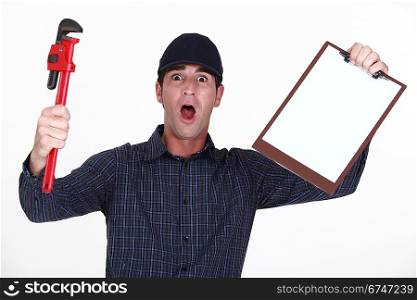 Outraged plumber holding clip-board