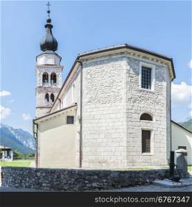 Outside the apse and bell tower of a church in the 17th century in Northern Italy