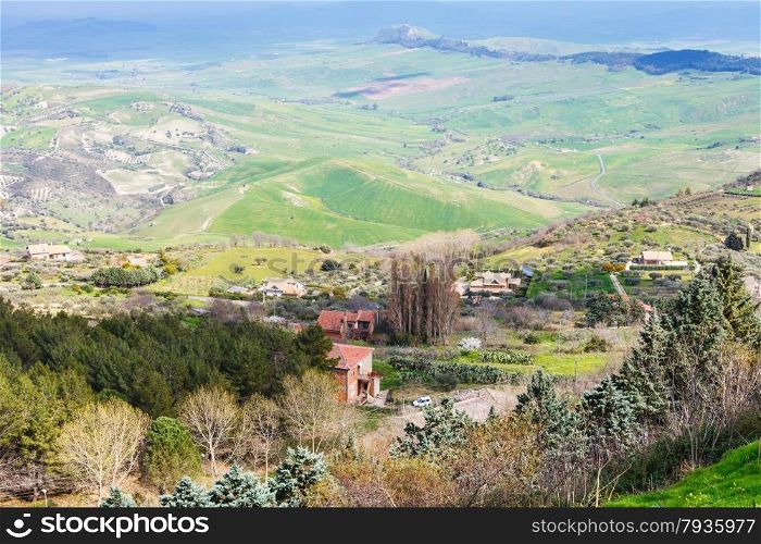 outskirts of Aidone town in green sicilian hills in spring, Italy