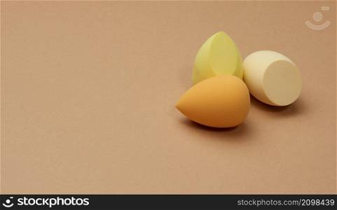 oval new egg-shaped sponges for cosmetics and foundation, copy space