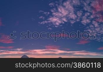Over the mountain tops vast blue sky. Bright day. Pink and white clouds float across the sky. Camera quickly rushes to meet them. Clouds approaching, the camera flies through them to the clear sky.