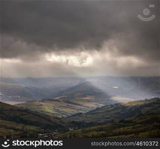 Overcast scene in cloudy mountains. November rain