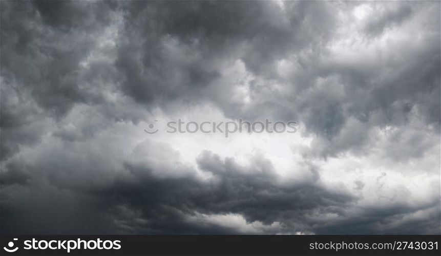 Overcast sky with storm clouds. Four shots composite picture.