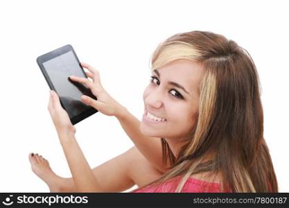 Overhead photograph of a beautiful young women sitting on floor using a tablet PC computer and smiling