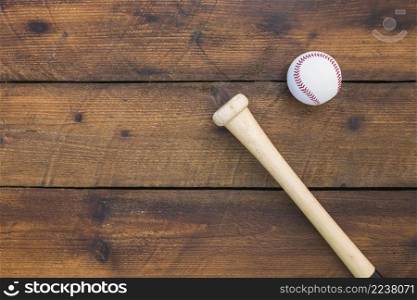 overhead view baseball bat ball wooden table