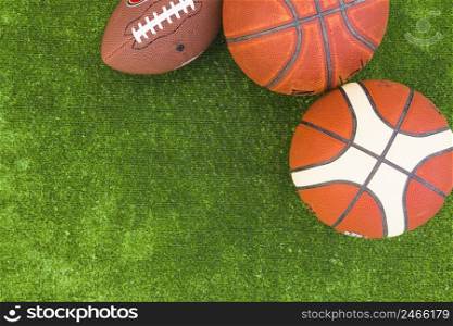 overhead view basketball rugby ball green turf