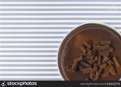 overhead view chocolate cake stripes background