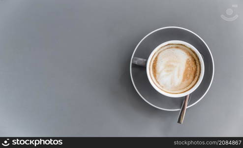 overhead view coffee latte grey background