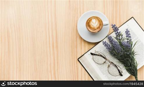 overhead view coffee latte lavender flower spectacles notebook wooden background. High resolution photo. overhead view coffee latte lavender flower spectacles notebook wooden background. High quality photo