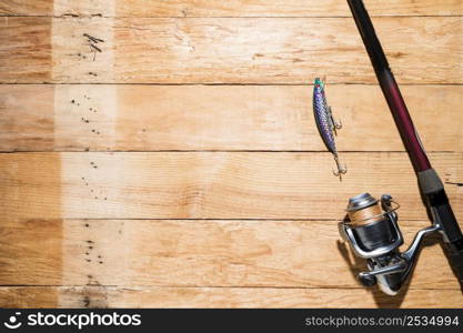 overhead view fishing lure with fishing rod desk