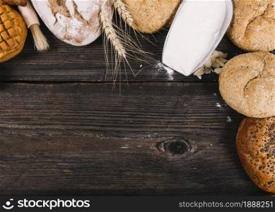 overhead view flour shovel with baked breads table . Resolution and high quality beautiful photo. overhead view flour shovel with baked breads table . High quality and resolution beautiful photo concept