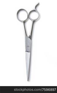 Overhead view of a pair of hairdressers scissors isolated on white background