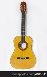 overhead view of guitar on white background