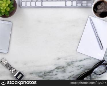 Overhead view of marble office desktop with computer keyboard, cell phone, pen, paper, reading glasses, coffee, watch and plant forming circle border.
