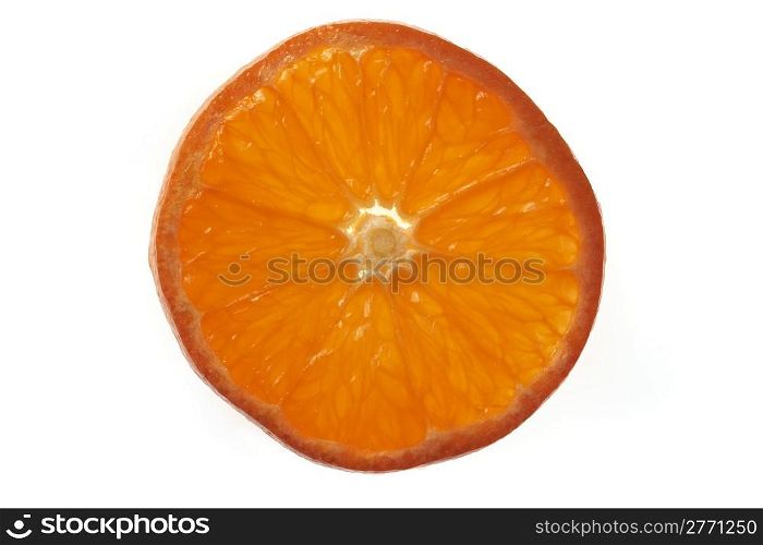 Overhead view of slice of orange on plain background