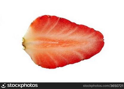 Overhead view of slice of strawberry on plain background